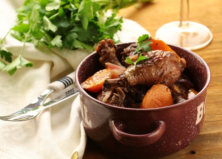 Coq au vin in a casserole dish