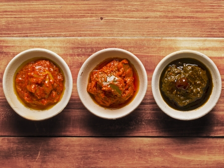 three bowls of Indian pickles