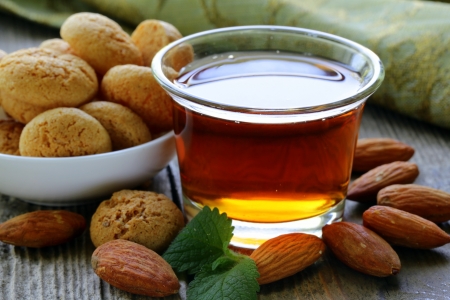 amaretto liqueur with amaretti biscuits and shelled almonds